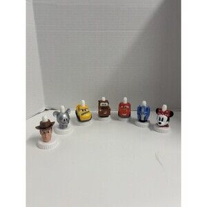 Lot of 7 Different Collectible Good 2 Grow Juice Toppers Cars Mickey Mouse Woody